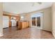 Bright eat-in kitchen featuring tile floors and access to the backyard at 4555 S Lowell Blvd, Denver, CO 80236