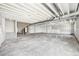 Unfinished basement with visible framework, plumbing, and a concrete floor at 1957 S Coolidge Way, Aurora, CO 80018
