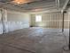 Unfinished basement featuring concrete floors, white sheetrock walls, and exposed ceiling at 1957 S Coolidge Way, Aurora, CO 80018
