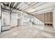 Unfinished basement featuring concrete floors, wrapped walls and exposed ductwork at 1957 S Coolidge Way, Aurora, CO 80018
