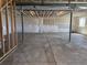 Unfinished basement featuring concrete floors, white sheetrock walls, and exposed ceiling at 1957 S Coolidge Way, Aurora, CO 80018