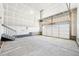 Spacious garage with high ceilings, and ample room for vehicles and storage at 1957 S Coolidge Way, Aurora, CO 80018