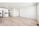 Spacious open-concept area with modern flooring and abundant natural light, perfect for entertaining at 1957 S Coolidge Way, Aurora, CO 80018