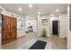Basement featuring wood floors, neutral walls, a yoga mat and exercise equipment at 93 Glenmoor Dr, Cherry Hills Village, CO 80113