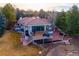 Beautiful home featuring a large deck and patio for outdoor living and entertaining at 93 Glenmoor Dr, Cherry Hills Village, CO 80113