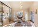 Cozy sitting room with plush chairs, natural light, and elegant decor at 93 Glenmoor Dr, Cherry Hills Village, CO 80113