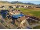 Aerial view of community with pool, playground and homes at 18455 W 94Th Ave, Arvada, CO 80007