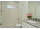 Clean bathroom with shower/tub combo and granite countertop at 18455 W 94Th Ave, Arvada, CO 80007