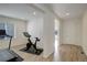 Light and bright entryway with home gym view at 18455 W 94Th Ave, Arvada, CO 80007