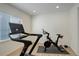 Home gym with Peloton bike and treadmill at 18455 W 94Th Ave, Arvada, CO 80007