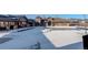 Community pool and clubhouse covered in snow at 18455 W 94Th Ave, Arvada, CO 80007