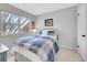 Comfortable bedroom featuring a large window allowing for plenty of natural light at 3706 E Easter Dr, Centennial, CO 80122