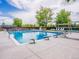 Community pool with lounge chairs and lifeguard stand at 3706 E Easter Dr, Centennial, CO 80122