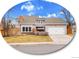 Charming home with a two-car garage and manicured front yard at 3706 E Easter Dr, Centennial, CO 80122