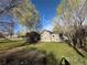 Charming single-story home with a well-maintained lawn and mature trees at 1129 2Nd Ave, Longmont, CO 80501