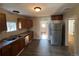 Classic kitchen featuring stainless steel appliances, wood cabinets, and hardwood floors at 1129 2Nd Ave, Longmont, CO 80501