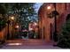 Charming street view featuring brick buildings, trees, and outdoor lighting at 1129 2Nd Ave, Longmont, CO 80501