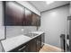 Well-lit kitchen featuring stainless steel appliances, subway tile backsplash and elegant white countertops at 4110 Hale Pkwy # 5F, Denver, CO 80220