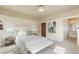 Spacious bedroom with ensuite bathroom access and neutral decor at 1827 N Bellaire St, Denver, CO 80220