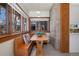 Cozy breakfast nook with bench seating, wood trim, and great natural light at 1827 N Bellaire St, Denver, CO 80220