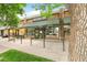 Storefront exterior showing sidewalk, large windows, and brick facade at 1827 N Bellaire St, Denver, CO 80220