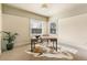 Home office with built-in desk and large windows at 1827 N Bellaire St, Denver, CO 80220