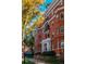 Beautiful brick building featuring multiple balconies and classic architectural details at 836 E 17Th Ave # 2E, Denver, CO 80218