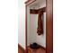Hallway coat nook with hooks and storage area at 836 E 17Th Ave # 2E, Denver, CO 80218