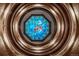 Ornate stained-glass ceiling, circular in design with detailed patterns and figures at 836 E 17Th Ave # 2E, Denver, CO 80218