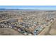 Aerial view of a residential area with mountain views at 410 Smith Cir, Erie, CO 80516