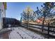 Small backyard with patio and wooden fence at 410 Smith Cir, Erie, CO 80516