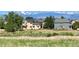 Two-story house exterior with mountain backdrop at 410 Smith Cir, Erie, CO 80516