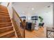 Wooden staircase leading to the upper level of the home at 410 Smith Cir, Erie, CO 80516