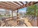 Outdoor deck area with pergola, perfect for entertaining or enjoying outdoor relaxation at 5745 W Atlantic Pl # 104, Lakewood, CO 80227