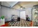 Home office space with desk, ceiling fan, and unique patterned flooring at 5745 W Atlantic Pl # 104, Lakewood, CO 80227