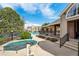 Condo community pool closed for the season with other condos in the background at 5745 W Atlantic Pl # 104, Lakewood, CO 80227