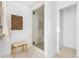 Clean bathroom with glass-enclosed shower, neutral colors and bright light at 6686 E Jamison Ave, Centennial, CO 80112