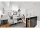 Bright bedroom with modern decor, plush bed and view to the outside at 6686 E Jamison Ave, Centennial, CO 80112
