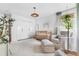 Bright Bedroom features white walls, neutral furniture, and natural light creating a calming atmosphere at 6686 E Jamison Ave, Centennial, CO 80112