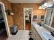 Spacious bathroom with double sinks, granite countertop, textured walls and walk-in closet at 85 S Sherwood Gln, Monument, CO 80132