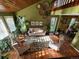 Open-concept living room boasts vaulted ceilings, hardwood floors, and a seamless flow at 85 S Sherwood Gln, Monument, CO 80132