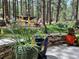 Picturesque backyard space featuring a patio, a variety of potted plants, and a relaxing hammock at 85 S Sherwood Gln, Monument, CO 80132
