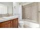 Bathroom with a tiled shower and vanity sink at 8802 E 148Th Ln, Thornton, CO 80602