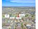 Aerial view showcases community layout with pool, clubhouse, park, and neighborhood at 22441 E Chenango Dr, Aurora, CO 80015