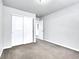 Bedroom with a closet and a door way to the hallway at 22441 E Chenango Dr, Aurora, CO 80015