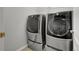 Laundry room features stacked washer and dryer at 22441 E Chenango Dr, Aurora, CO 80015