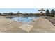 Community pool with lounge chairs, shaded seating areas, and clear, inviting water at 22441 E Chenango Dr, Aurora, CO 80015