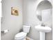 Clean and simple powder room at 22441 E Chenango Dr, Aurora, CO 80015