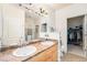 Double vanity bathroom with shower and walk-in closet at 8551 Gold Peak Dr # B, Highlands Ranch, CO 80130
