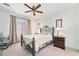 Bright bedroom with ceiling fan and neutral decor at 8551 Gold Peak Dr # B, Highlands Ranch, CO 80130